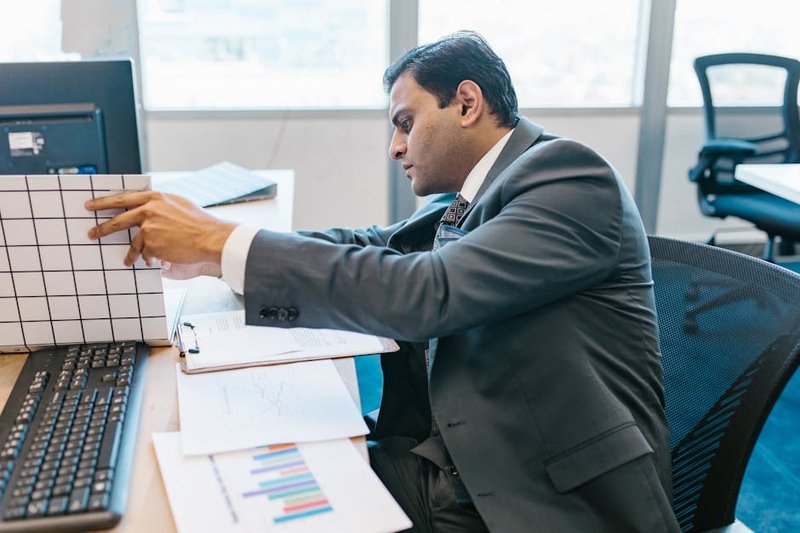 Melbourne business owner reviewing SEO analytics - seo agency melbourne