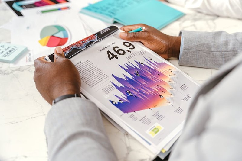 business owner reviewing analytics - geo or seo