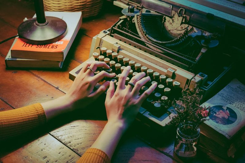 writer editing content with AI score - ai tools for seo keyword research